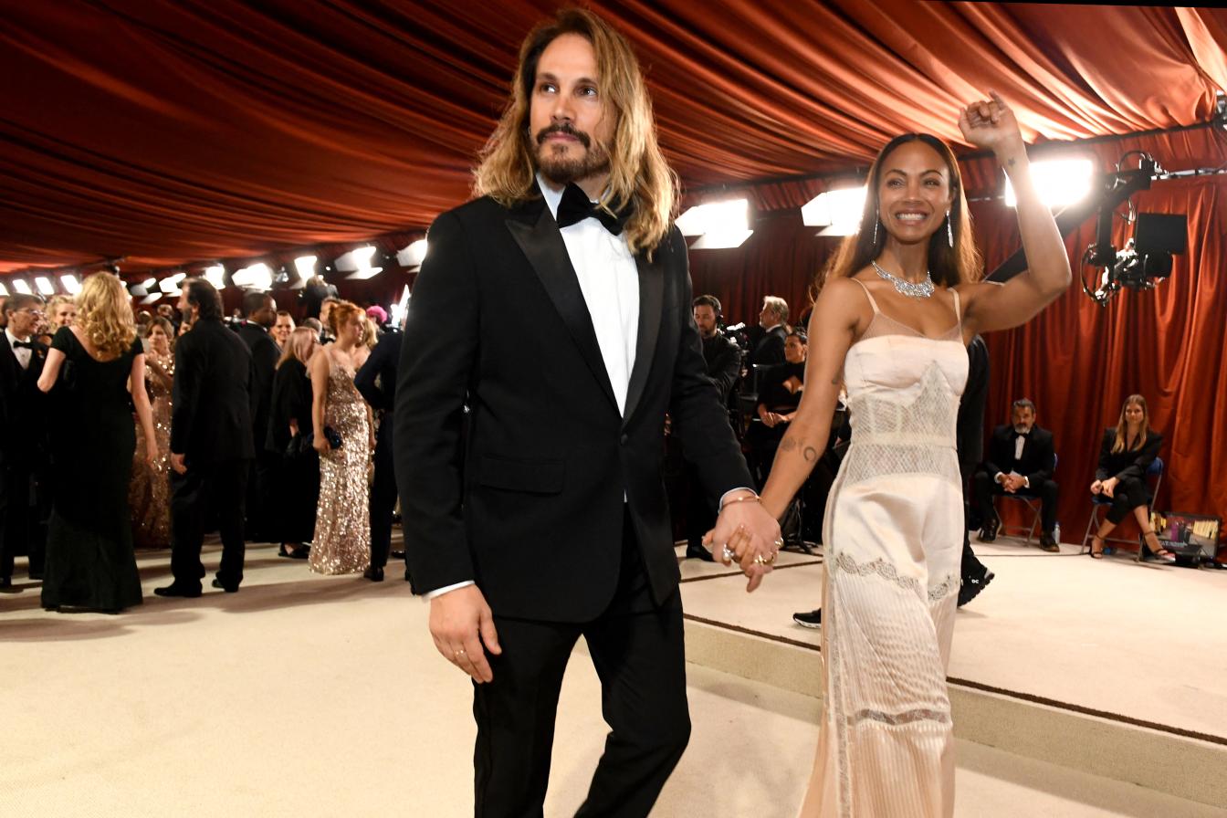 US actress Zoe Saldana and husband Marco Perego Saldana attend the 95th Annual Academy Awards at the Dolby Theatre in Hollywood