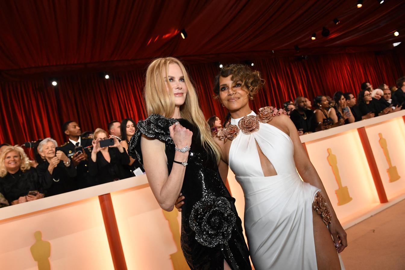 US-Australian actress Nicole Kidman and US actress Halle Berry attend the 95th Annual Academy Awards at the Dolby Theatre in Hollywood