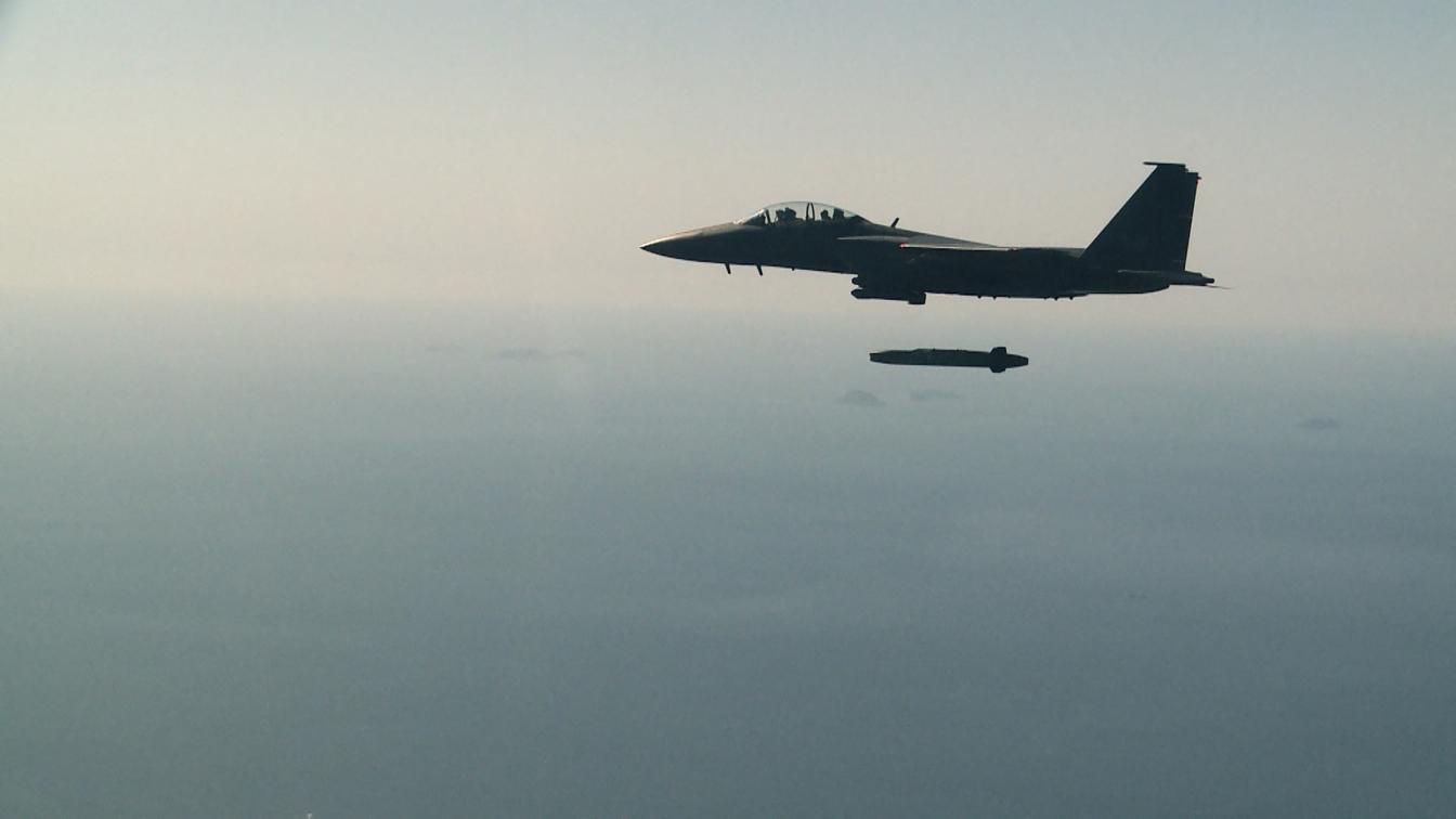 A South Korean Air Force F-15K fighter jet firing a Taurus long-range air-to-surface missile